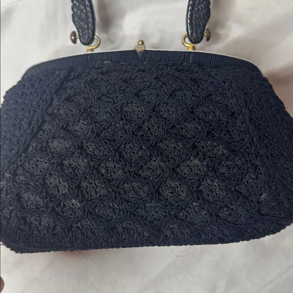 Vintage 60’s Black Knit Dumpling Bag With Silver And Gold Fixtures.